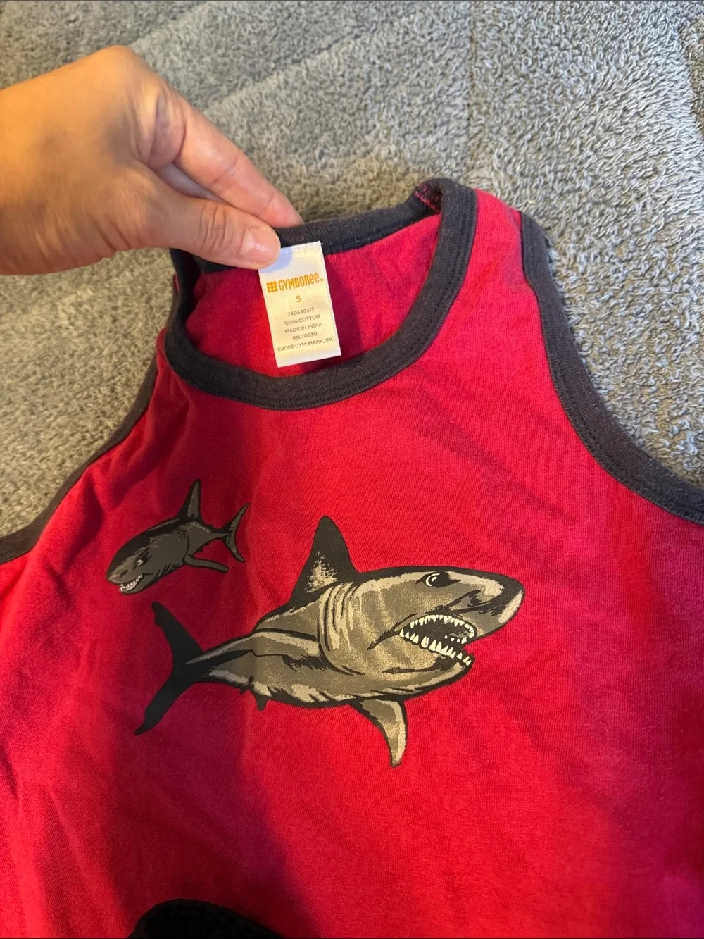Red Shark Tank Top with Black Athletic Shorts